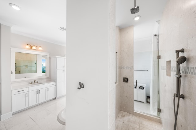 bathroom with visible vents, a shower stall, vanity, and recessed lighting