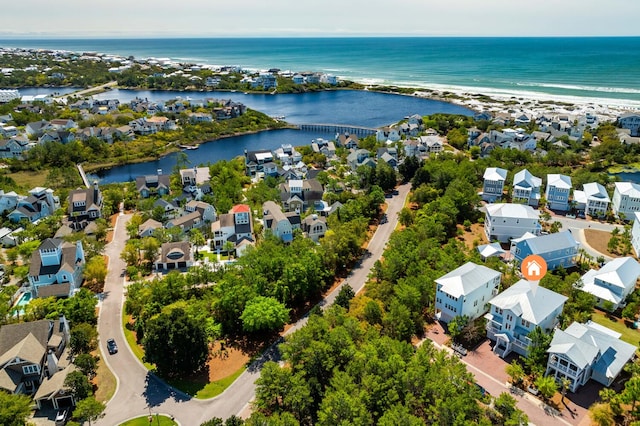 aerial view featuring a water view and a residential view