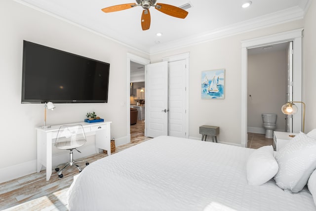 bedroom featuring baseboards, visible vents, and ornamental molding