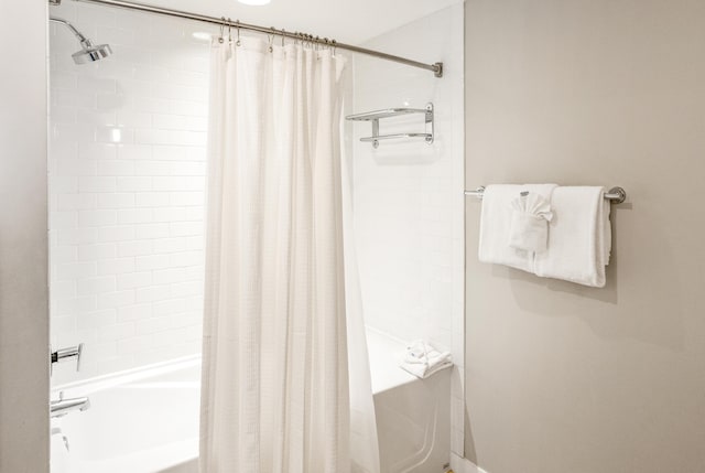 full bathroom featuring shower / tub combo with curtain