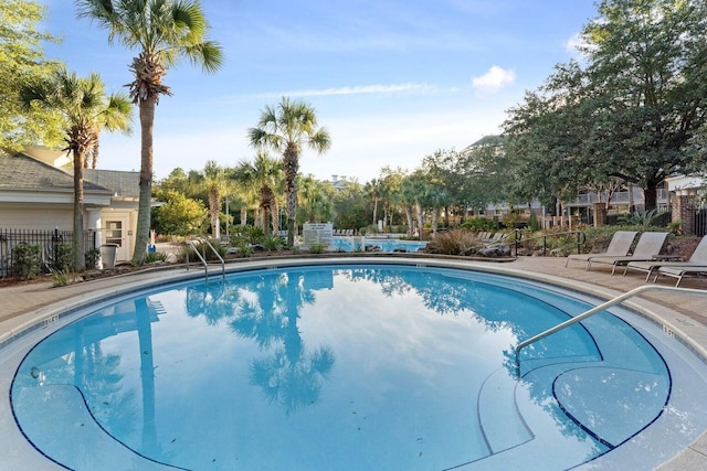 pool featuring fence