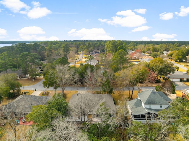 bird's eye view featuring a forest view