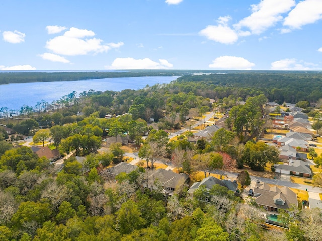 birds eye view of property featuring a water view and a residential view