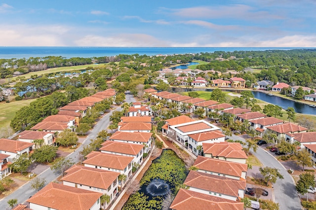 aerial view with a water view and a residential view