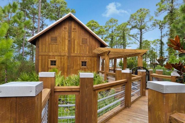 view of side of home featuring a wooden deck