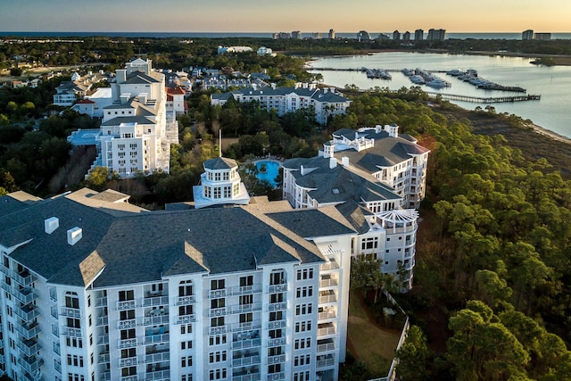 aerial view at dusk with a water view