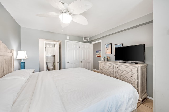 bedroom featuring baseboards, visible vents, a ceiling fan, connected bathroom, and light tile patterned flooring