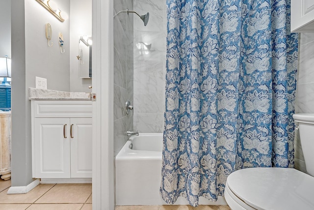 full bath with toilet, vanity, shower / tub combo with curtain, and tile patterned floors