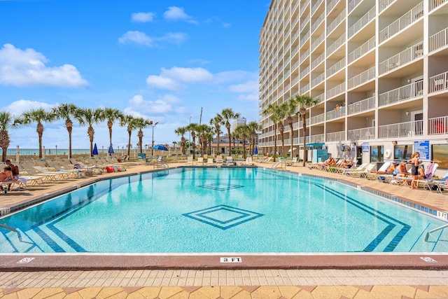 community pool with a patio