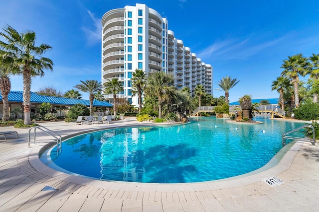 view of pool featuring a patio area