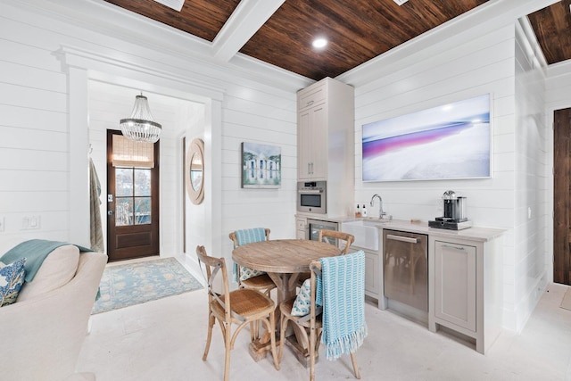 35 Tupelo St, Santa Rosa Beach, FL 32459 - dining room with wood ceiling, beamed ceiling, a chandelier, wooden walls, and recessed lighting