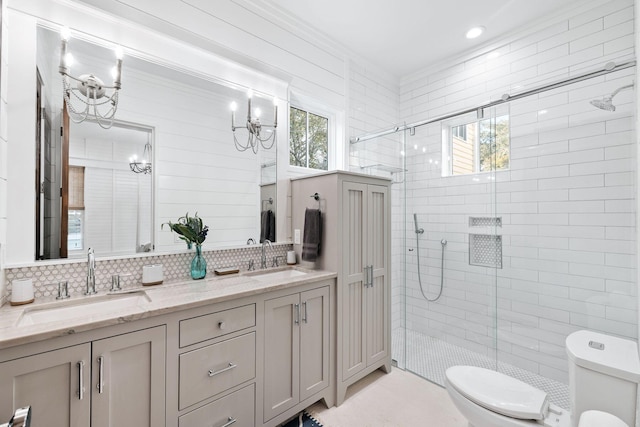 35 Tupelo St, Santa Rosa Beach, FL 32459 - bathroom with a sink, a notable chandelier, toilet, and a shower stall