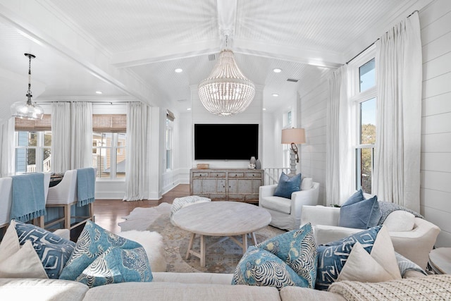 35 Tupelo St, Santa Rosa Beach, FL 32459 - living room with crown molding, beamed ceiling, wood finished floors, and a notable chandelier