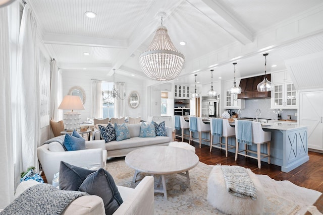 35 Tupelo St, Santa Rosa Beach, FL 32459 - living area with an inviting chandelier, recessed lighting, vaulted ceiling with beams, and dark wood-style floors