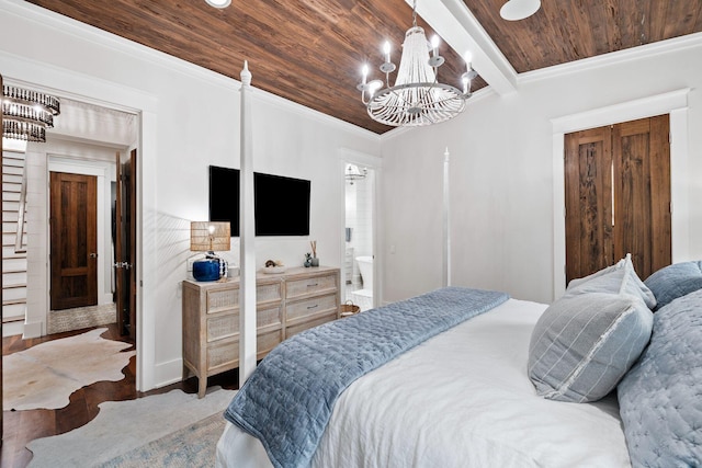 35 Tupelo St, Santa Rosa Beach, FL 32459 - bedroom with an inviting chandelier, ornamental molding, wood finished floors, beamed ceiling, and wooden ceiling
