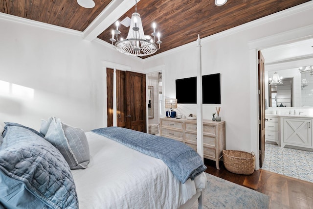 35 Tupelo St, Santa Rosa Beach, FL 32459 - bedroom with vaulted ceiling with beams, wood finished floors, a notable chandelier, and wooden ceiling