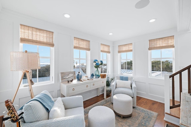35 Tupelo St, Santa Rosa Beach, FL 32459 - sitting room with wood finished floors, recessed lighting, and a decorative wall