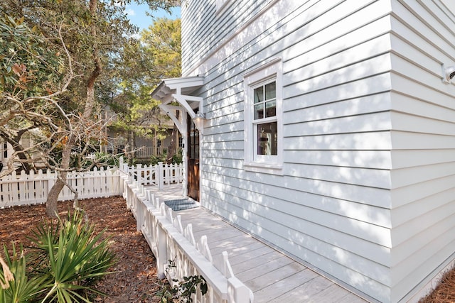 35 Tupelo St, Santa Rosa Beach, FL 32459 - view of side of home featuring fence