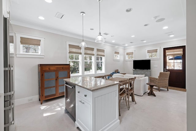 35 Tupelo St, Santa Rosa Beach, FL 32459 - kitchen with visible vents, crown molding, white cabinetry, light stone counters, and hanging light fixtures