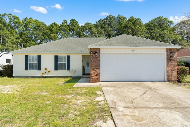 single story home with brick siding, a shingled roof, a front lawn, a garage, and driveway