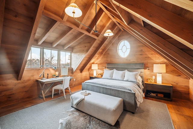 bedroom with wood walls, multiple windows, wood-type flooring, and lofted ceiling with beams