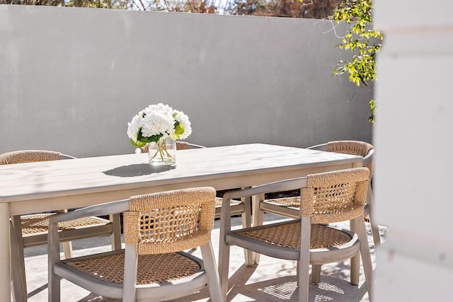 balcony with outdoor dining area