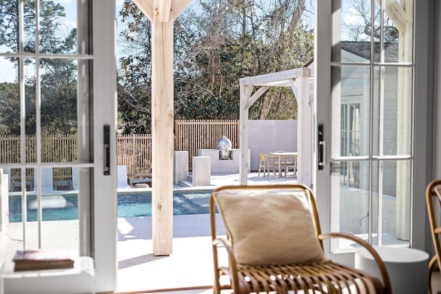 doorway to outside featuring a healthy amount of sunlight