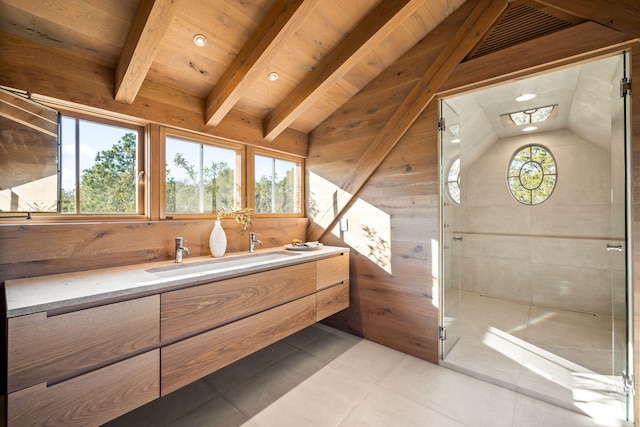 bathroom with lofted ceiling with beams, tile patterned flooring, visible vents, wood walls, and a sink