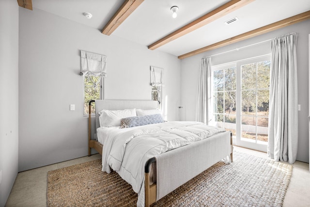 bedroom featuring beam ceiling, access to outside, and visible vents