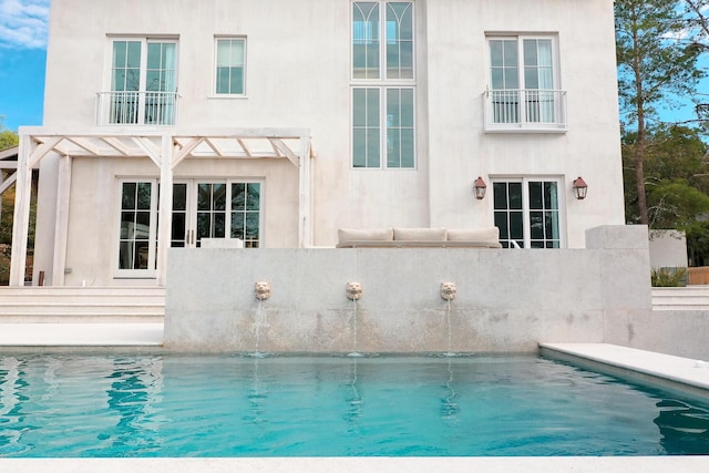 view of swimming pool with a fenced in pool