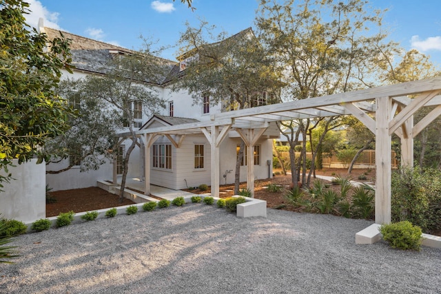 exterior space with a patio, stucco siding, and fence