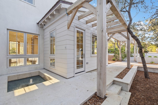 view of patio / terrace featuring a pergola