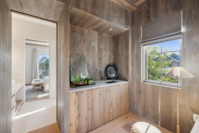 interior space featuring wooden walls