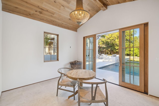 dining room with wooden ceiling, lofted ceiling with beams, and a notable chandelier
