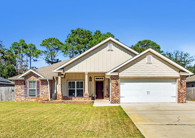 view of front of property featuring a garage, driveway, brick siding, and a front lawn