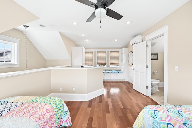 35 Town Hall Rd, Inlet Beach, FL 32461 - bedroom featuring lofted ceiling, recessed lighting, light wood-type flooring, baseboards, and a wall mounted air conditioner