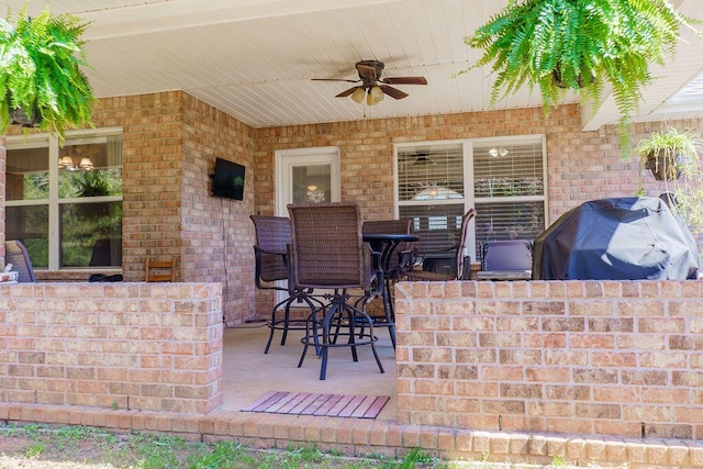 view of patio / terrace with ceiling fan and grilling area