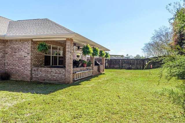 view of yard with fence