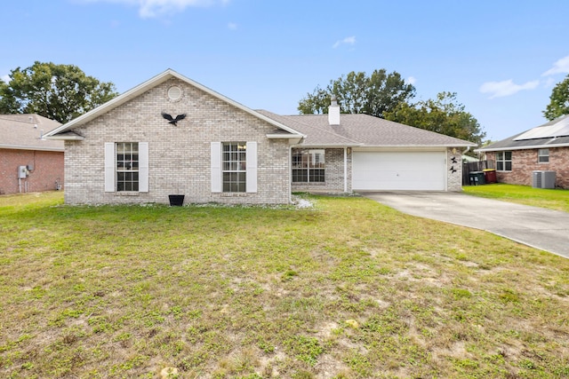 ranch-style house featuring a garage, a front yard, concrete driveway, and brick siding