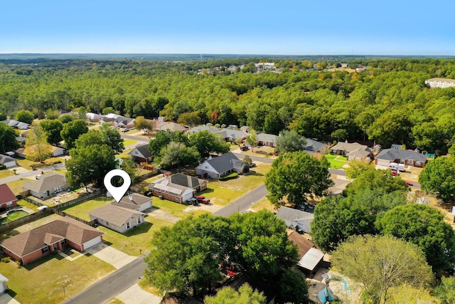 bird's eye view with a residential view and a view of trees