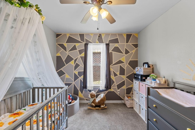 bedroom featuring carpet and baseboards