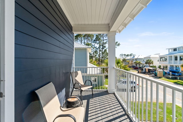 balcony featuring a residential view