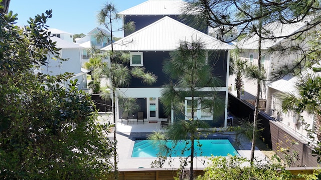 rear view of house with a patio area