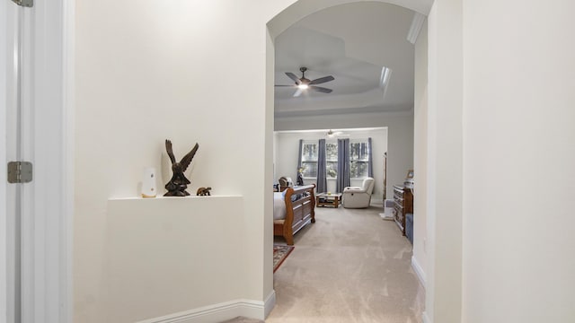 279 Tournament Ln, Freeport, FL 32439 - interior space with arched walkways, light colored carpet, baseboards, ornamental molding, and a tray ceiling