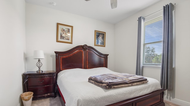 279 Tournament Ln, Freeport, FL 32439 - carpeted bedroom with ceiling fan and baseboards