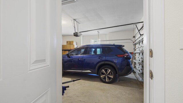 279 Tournament Ln, Freeport, FL 32439 - garage with a garage door opener