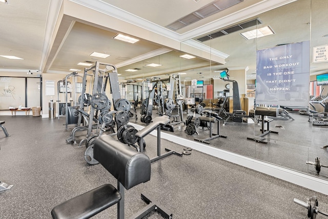 exercise room featuring ornamental molding