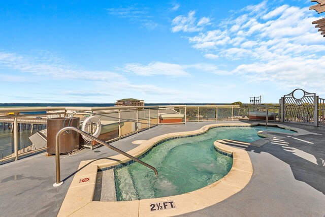 view of swimming pool featuring a fenced in pool and a patio area