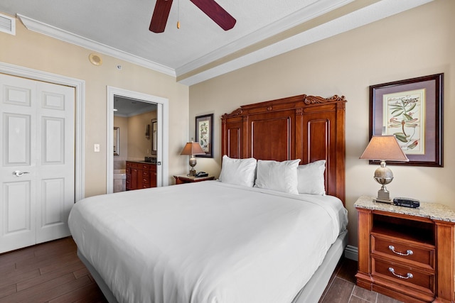 bedroom featuring dark wood finished floors, visible vents, ornamental molding, connected bathroom, and ceiling fan