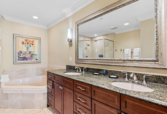 full bathroom with crown molding, a garden tub, a sink, and a shower stall